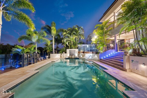 This Hope Island home for sale has a pool and spa.