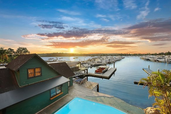 A weatherboard boathouse will be knocked down to make way for a four-level, five-bedroom, five-bathroom mansion.
