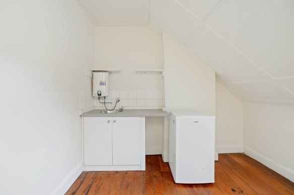 This top floor Glebe studio is for rent for $230 a week and shares a bathroom on level two. 