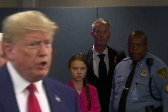 Swedish activist Greta Thunberg watches US President Donald Trump arrive at the UN Climate Summit in September.