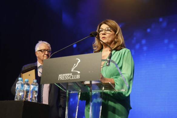 Caroline Wilson accepts her award at the 2022 Quills in Melbourne.