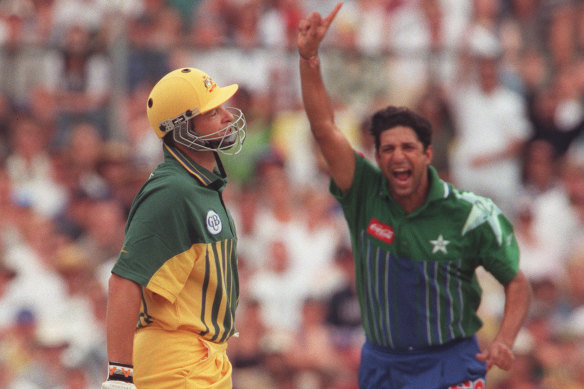 Wasim Akram celebrates as Mark Waugh is on his way.