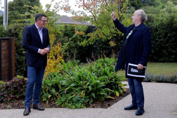 Victorian Premier Daniel Andrews, left, and Mushroom boss Michael Gudinski have teamed up to create a new online space for Australian musicians to connect with audiences.