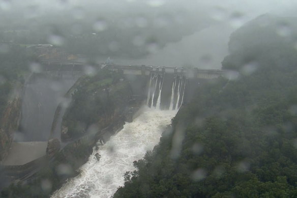 Floodwater spills over Warragamba Dam on Sunday.