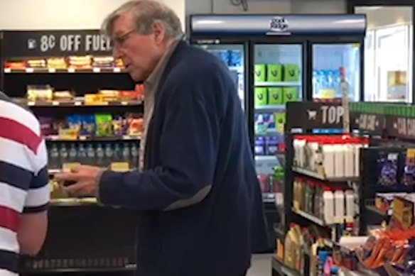 Cardinal George Pell at a service station on Wednesday.
