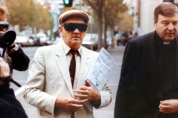 Notorious paedophile Gerald Ridsdale, and George Pell outside of the magistrates court in 1993.