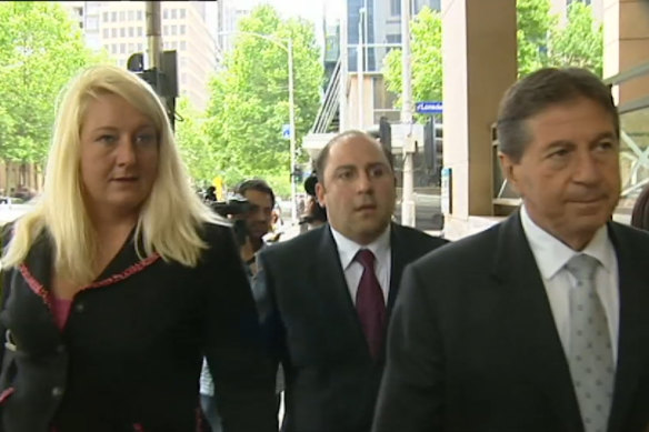 Nicola Gobbo (left) with Tony Mokbel outside court in 2004. She and Con Heliotis, QC (right), were representing the crime boss at the time.