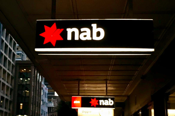 NAB is defending a claim from a trader who says she was underpaid.