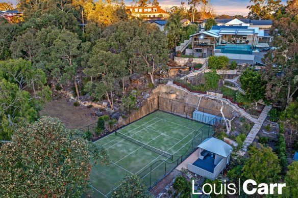 The Glenhaven home has an award-winning pool and a tennis court.
