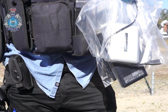 Police with evidence seized.