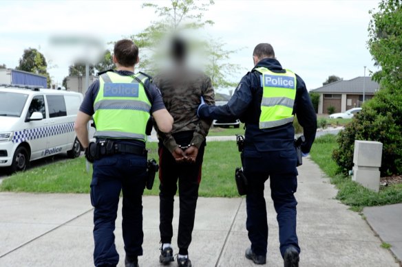 Police arrest an alleged offender in Cranbourne West as part of Operation Liege. 