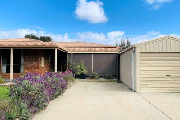 The four-bedroom, two-bathroom house at 13 Fairway Ave, Golden Beach is guided at $425,000.