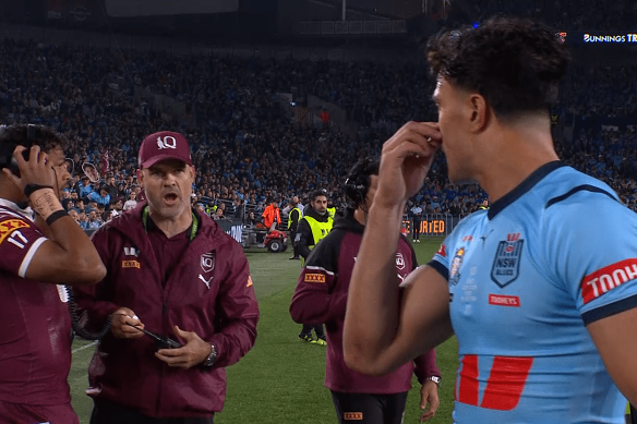 Queensland assistant coach Nate Myles sledges Joseph Suaalii after he was sent off in game one.
