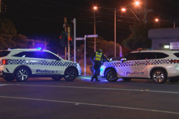 Police at the scene of the fatal crash.