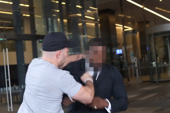 A man attacks a Channel Nine security guard on March 1, 2021. Police allege the attacker was Thomas Sewell.