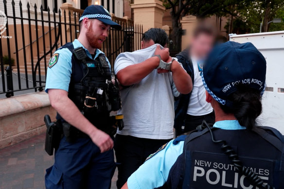 A man was arrested outside Parliament House in Sydney’s CBD.