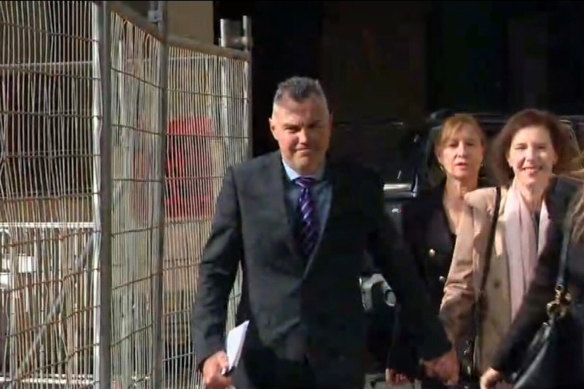 Stephen Kaless with his wife and legal team outside court in August 2020.