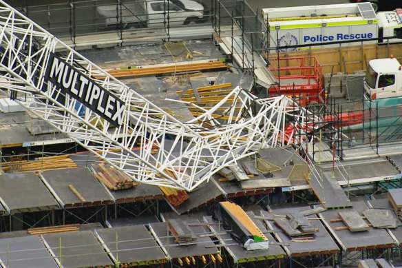 A man suffered back injuries when the crane collapsed.