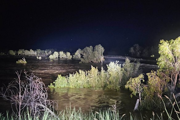 A man has been rescued from crocodile-infested floodwaters in Far North Queensland.