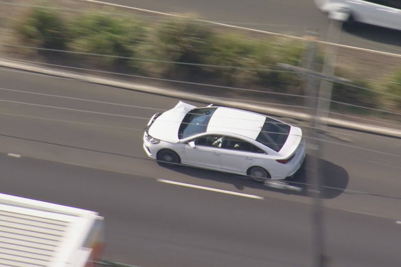 The white Hyundai leads police on a chase through Sydney’s west on Thursday.