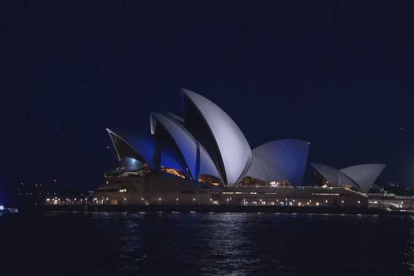 Sydney Opera House lit up with the colours of the Israeli flag.