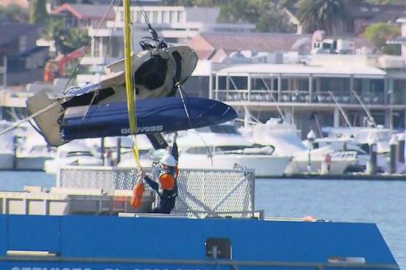 The jet ski is recovered from the Georges River. 