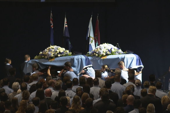 Thousands gathered at the memorial service for fallen Queensland police officers Rachel McCrow and Matthew Arnold.