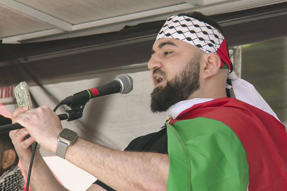 Hash Tayeh speaking at a Free Palestine rally in Melbourne in November.