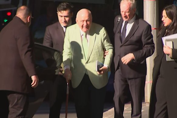 Alan Jones arrives at the Local Court in Sydney on Friday.