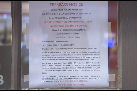 A note posted outside the Topolinis Caffe on Tuesday after one of its owners was arrested. 