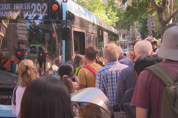 Commuters await alternative transport at Wynyard station.