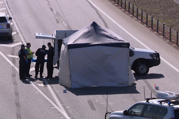 WA Police at the scene of where a man’s body was found on Tonkin Highway in Noranda on Thursday. 