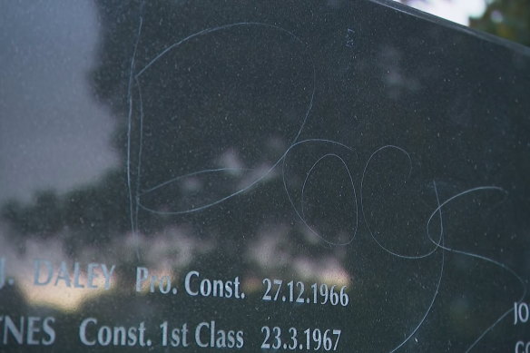 The damage was above the names of fallen officers. 