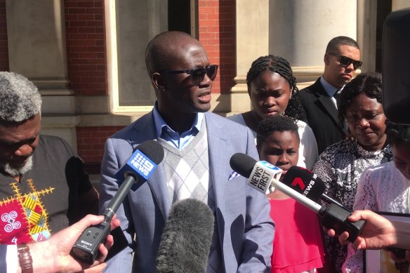 Gareth Tetteh’s father, Bosco, speaks to media outside the WA Supreme Court on Tuesday.