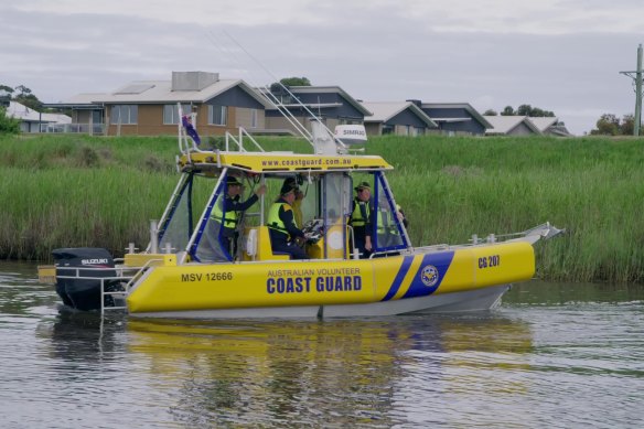 A Coast Guard boat searches for a missing person in the documentary series Missing Persons Investigation.