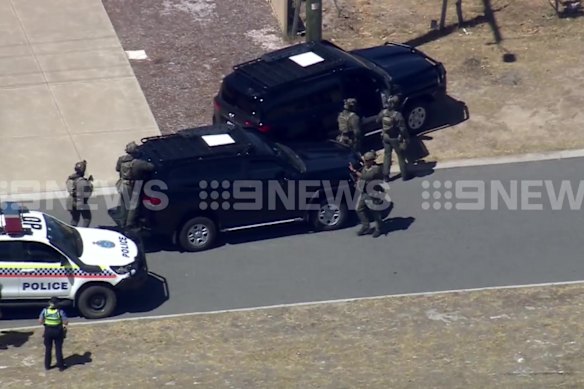 Police search Pinjarra, south of Perth, for an accused gunman on Tuesday.