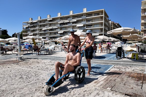 Shane Hryhorec enjoying an accessible beach in Antibes, France last year which was the inspiration for the Frankston pilot.