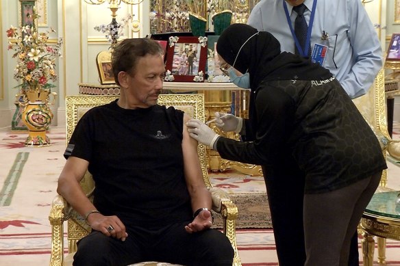 Brunei’s Sultan Hassanal Bolkiah receives a dose of COVID-19 vaccine at the royal palace in April.