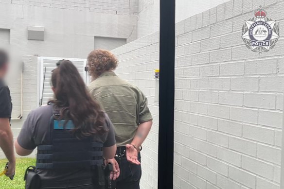 Spring is in custody on remand and has been suspended without pay.