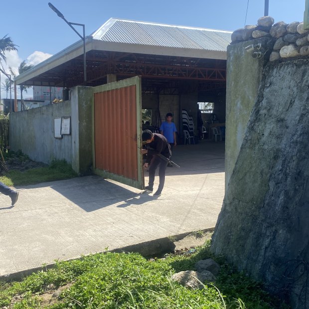 Security personnel at the entrance of the Degamo family compound this week.