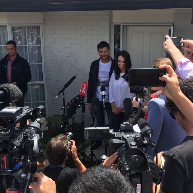 Ardern with partner Clarke Gayford in January, announcing her pregnancy outside their home.