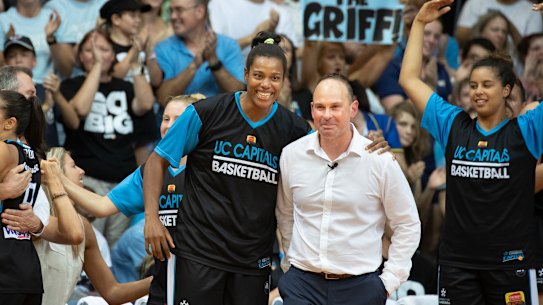 Kaili Mclaren with coach Paul Goriss as the WNBL grand final draws to a close.