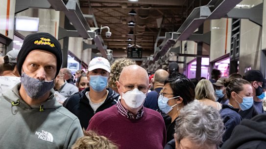 Melburnians wear face masks as they shop at the Queen Victoria Market.