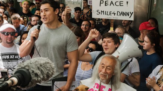 Hundreds took to Sydney Police Station to protest against the charges made against Mr Lim. 
