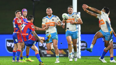 Mitchell Pearce slots the winning field goal in the dying minutes.