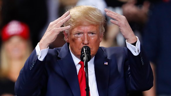 A visibly rattled US President Donald Trump raved and ranted at a rally in Battle Creek, Michigan, while the impeachment vote was taking place.