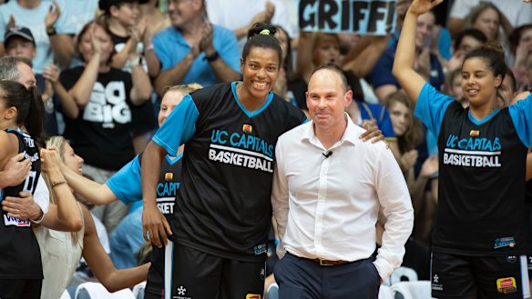 Kaili Mclaren with coach Paul Goriss as the WNBL grand final draws to a close.