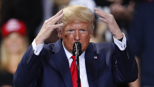 A visibly rattled US President Donald Trump raved and ranted at a rally in Battle Creek, Michigan, while the impeachment vote was taking place.