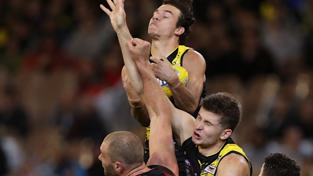 Tigers' Daniel Rioli marks.