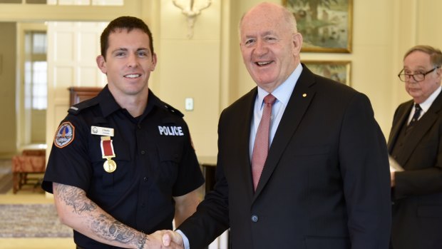  Former Canberra boy Constable Zach Rolfe, now with the Northern Territory police, with Governor-General Sir Peter Cosgrove.